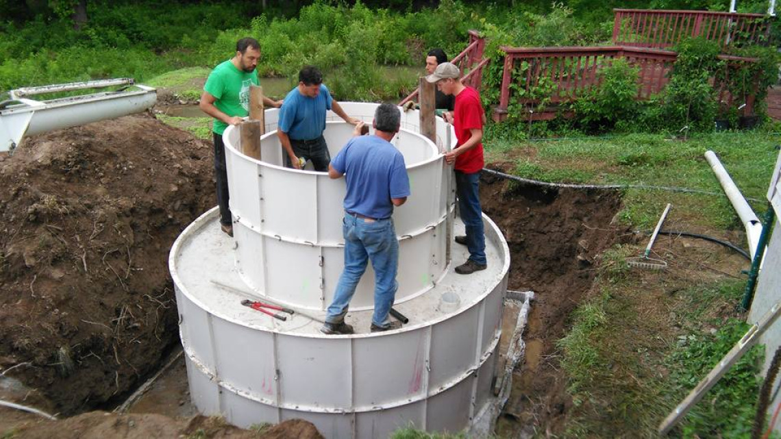 Members of Andrew Faust's Permaculture community participate in the Solar CITIES Training and Build at his Center for Bioregional Living